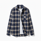 Navy and beige plaid shirt on a white background