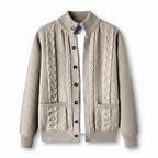 Beige cable knit cardigan on a white background