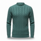 Green cable knit sweater on a white background